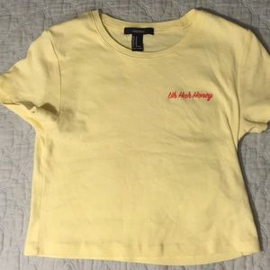 Light yellow soft cotton tee, “uh huh honey”